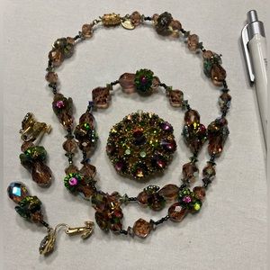 Vintage multi-colored aurora borealis crystal necklace, brooch, and earring set.